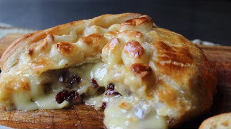 Cover Image for Baked Stuffed Brie with Cranberries & Walnuts